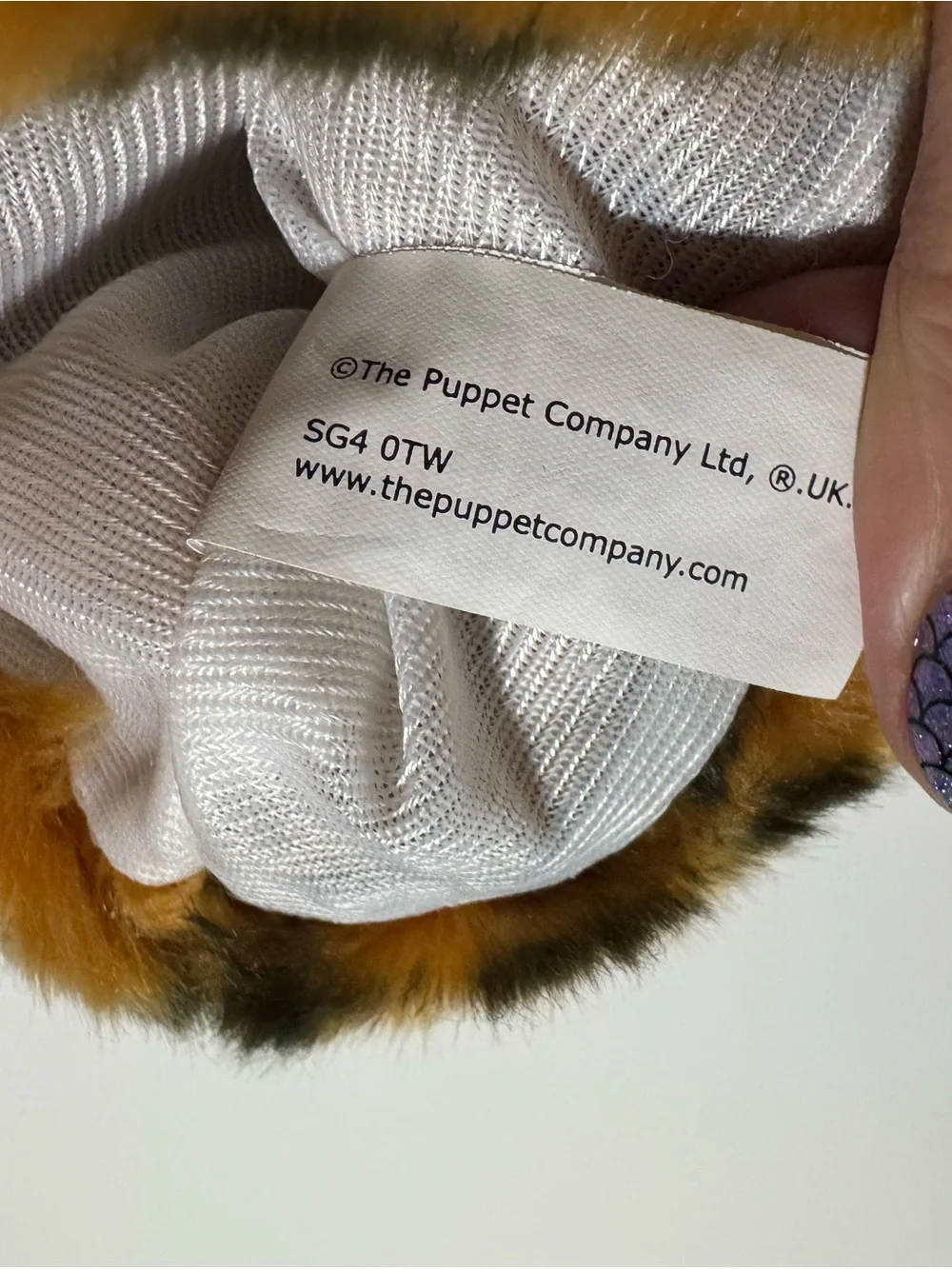 The Puppet Company Long Sleeve Tiger Puppet 15” orange and black.